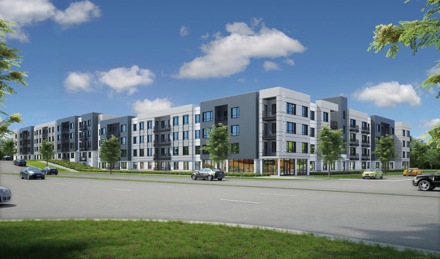 a large white building with cars parked in front of it